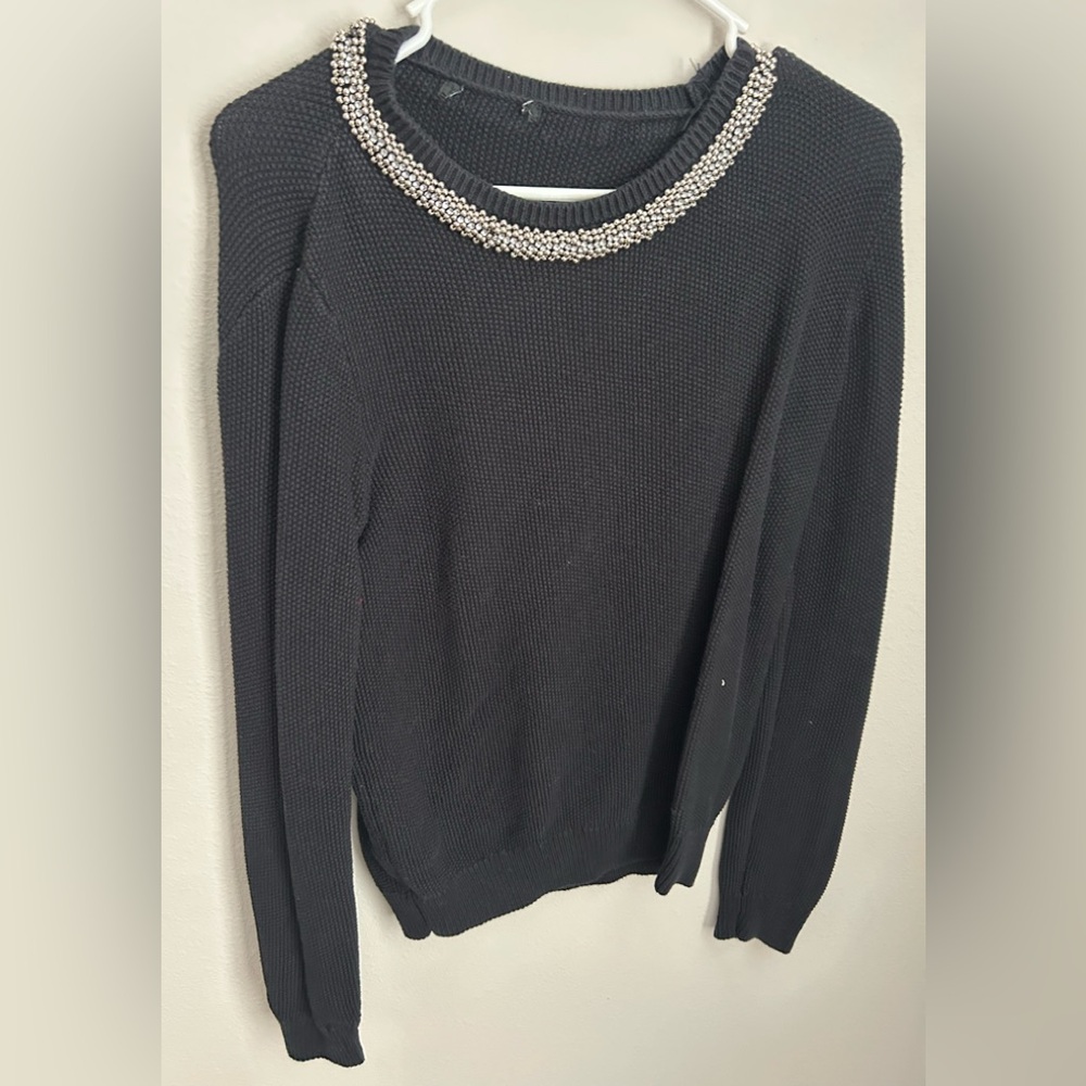 Elegant Black Sweater with Embellished Neckline